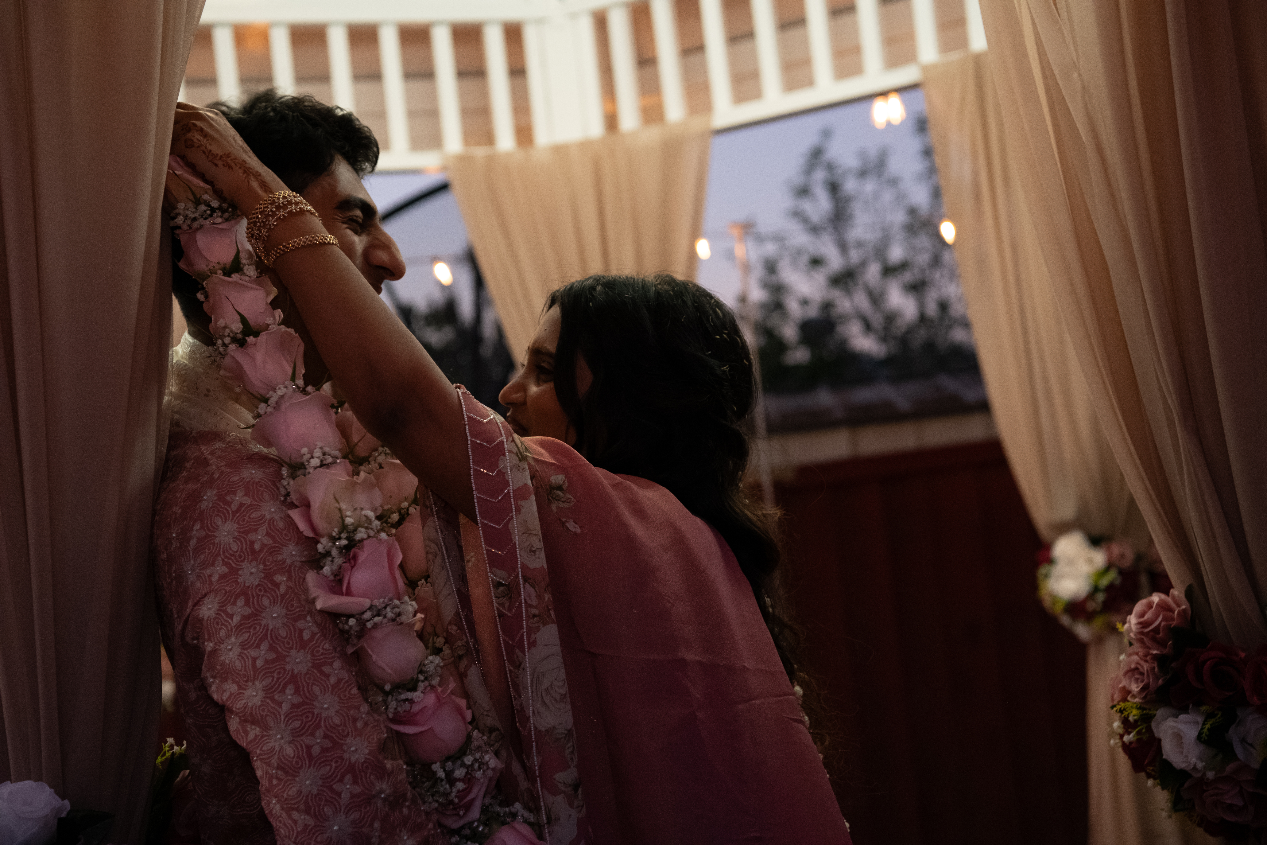 Keerthana and Yagnya wearing engagement garlands