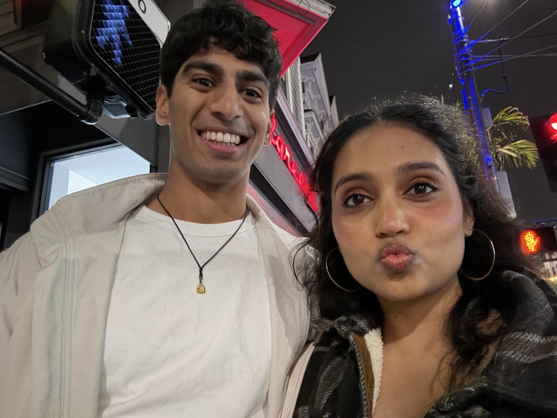 Keerthana and Yagnya taking a nighttime selfie